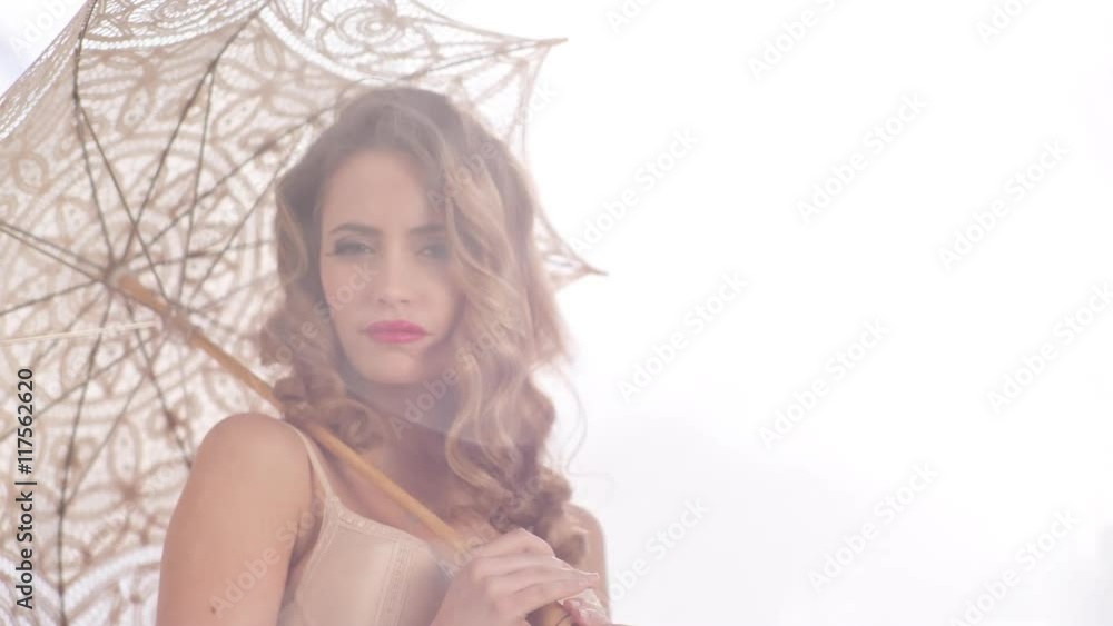 beautiful young woman poses with umbrella beautiful young woman poses with umbrella
