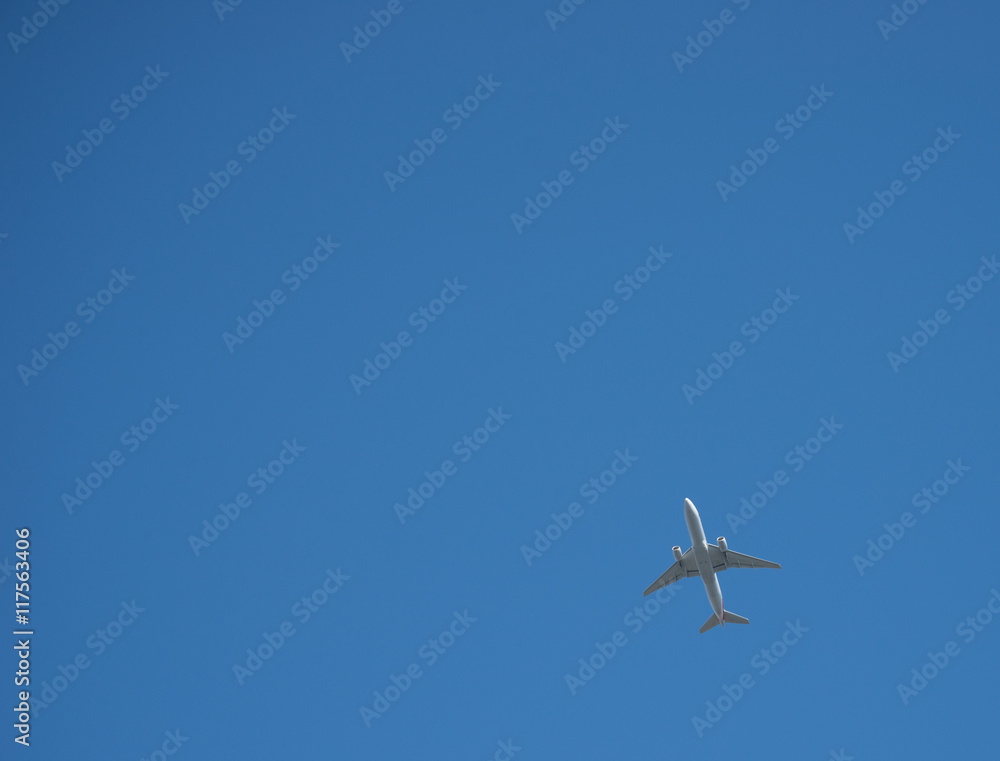 Passenger jet clear blue sky