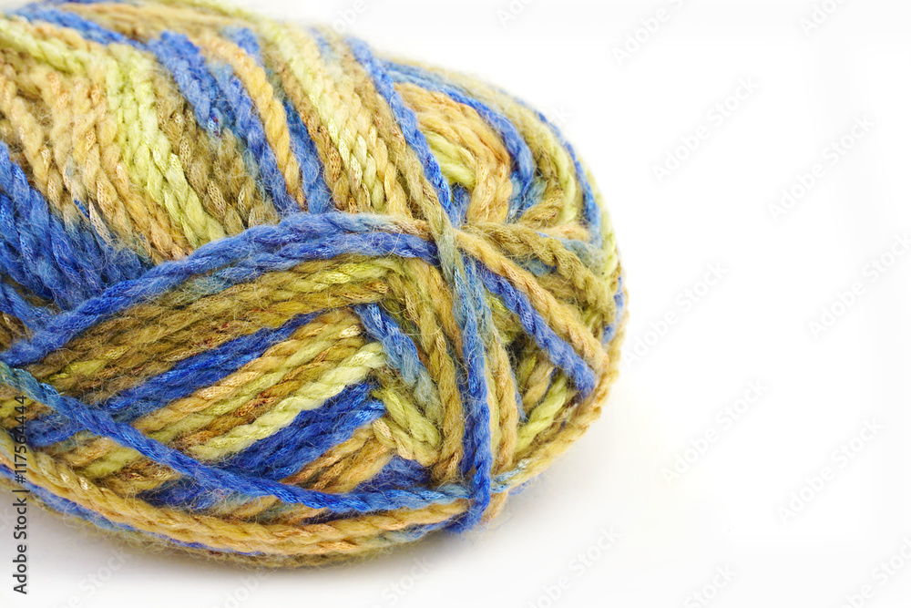 Background ball of yarn. Fall colors: beige, blue.