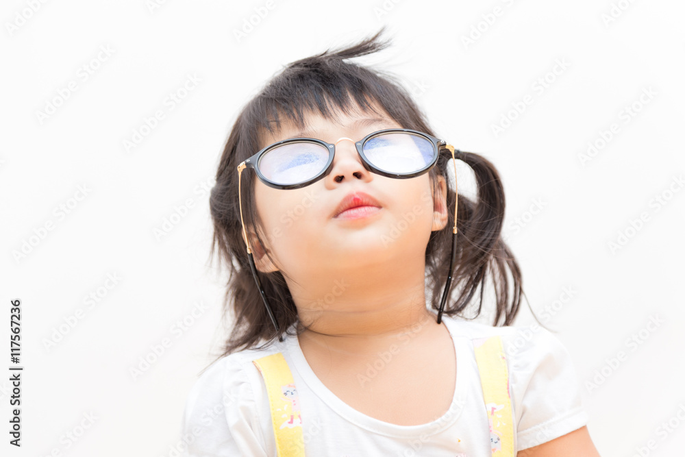 Asian cute little girl wearing glasses