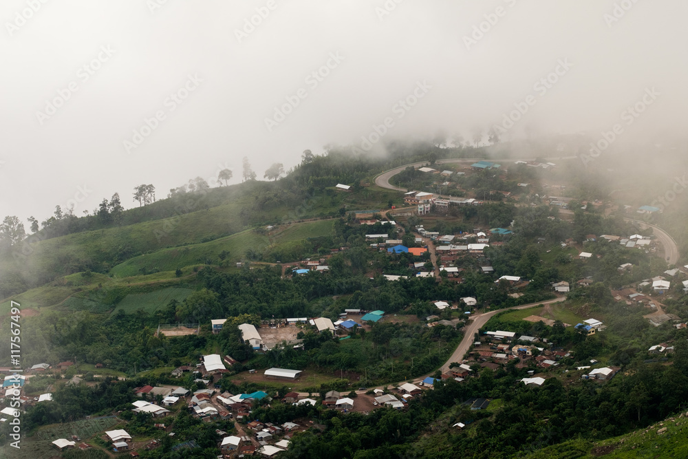 Obraz premium Village in the fog