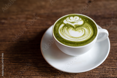 matcha green tea latte on a wooden table