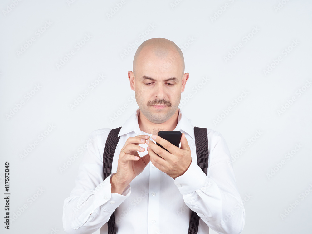 Man reading sms on your smartphone. Man reading sms on your smartphone.