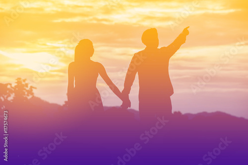 Young couple in love at sunset on the Mountain © stcom