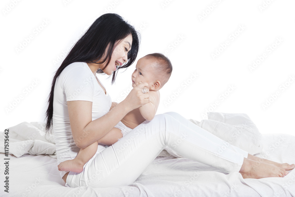 Mother playing with little baby Mother playing with little baby