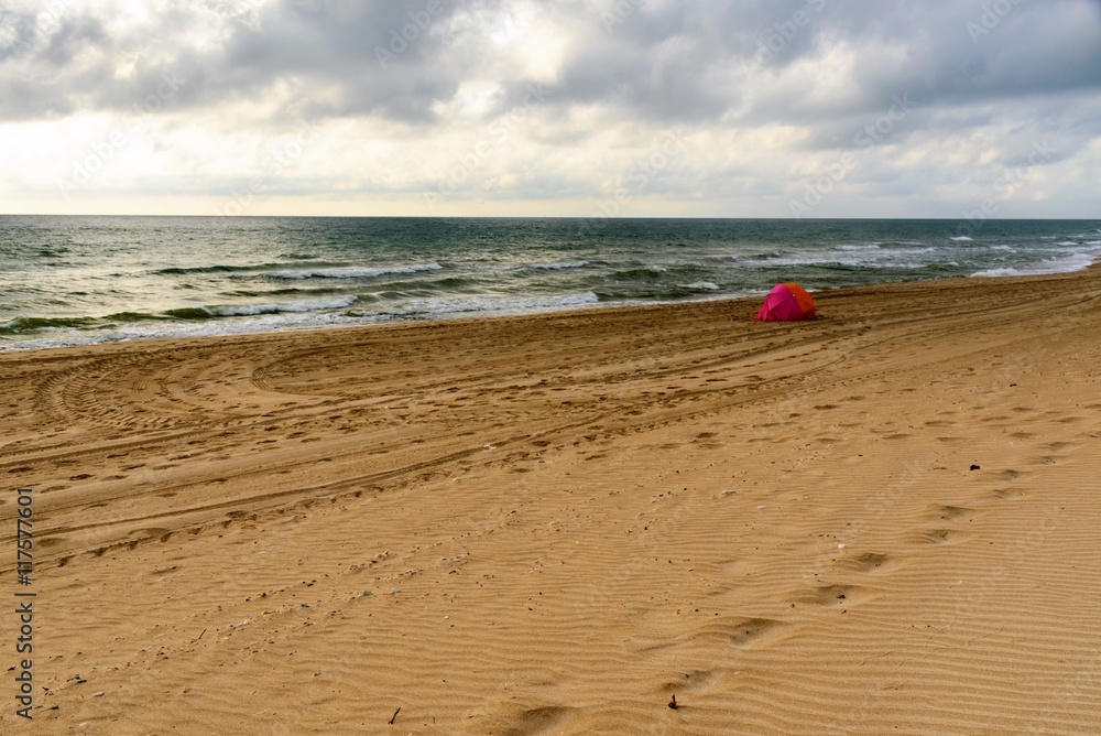 Beautiful tropical beach under gloomy sky Beautiful tropical beach under gloomy sky