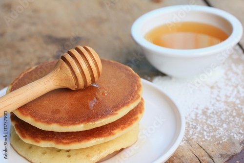 tasty pancake with honey