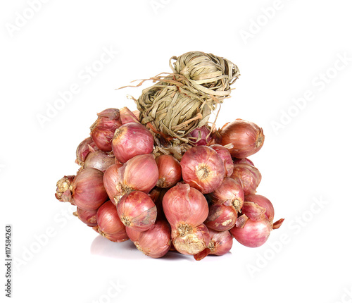 Shallots tie on white background.