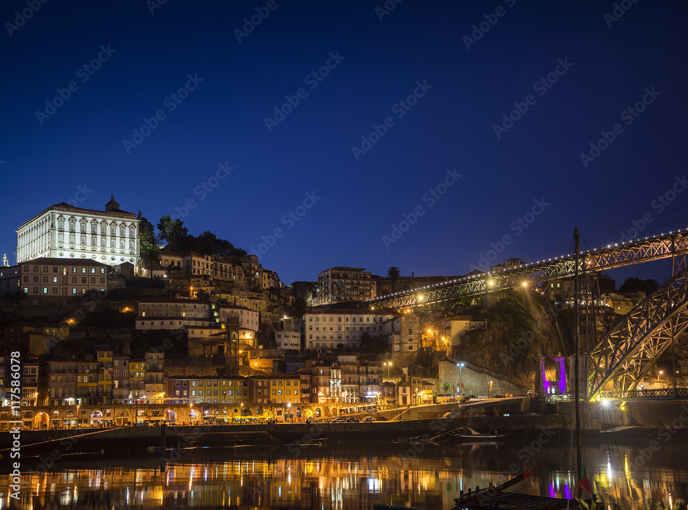 porto old town and landmark bridge in portugal at night