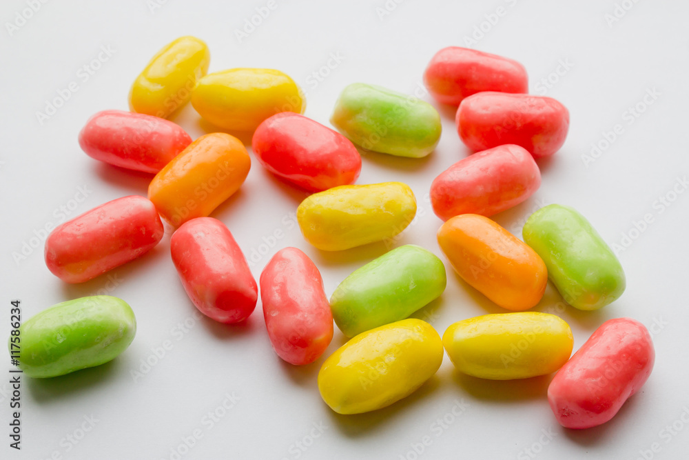 colored candy on white background closeup colored candy on white background closeup