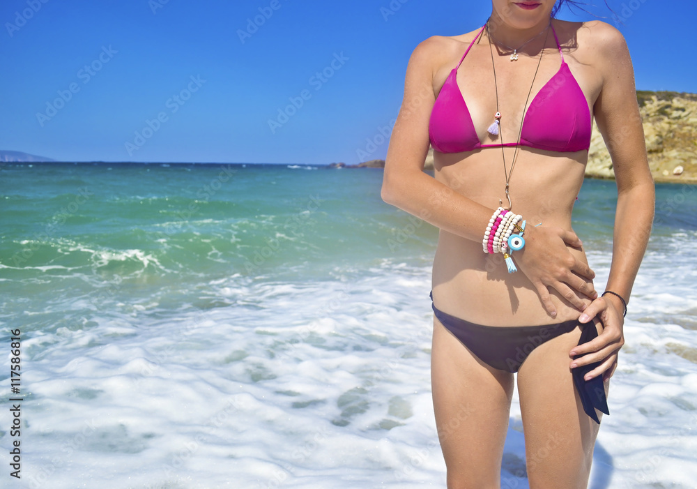 greek model advertises jewelry at the beach greek model advertises jewelry at the beach