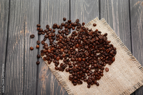Roasted coffee beans on the wooden table