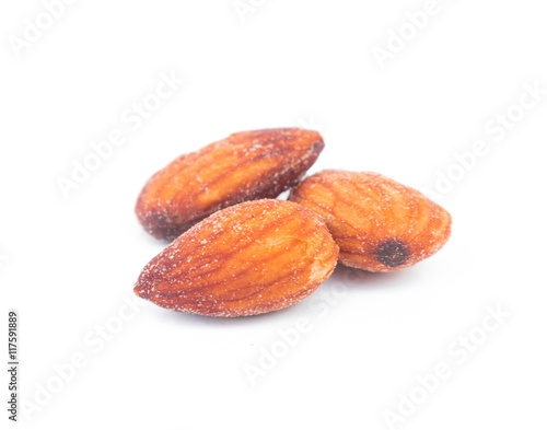 Closeup Almonds Salted on white background, selective focus