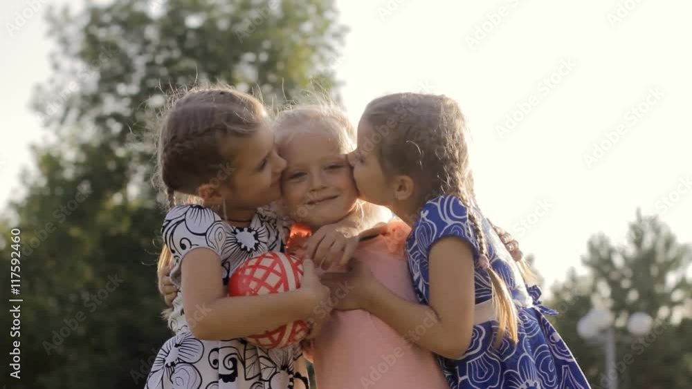 three sisters in a park three sisters in a park