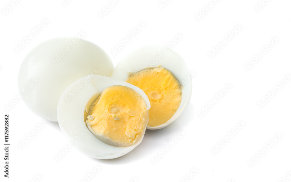 Closeup Peeled boiled egg and half egge on white background , food menu concept Closeup Peeled boiled egg and half egge on white background , food menu concept