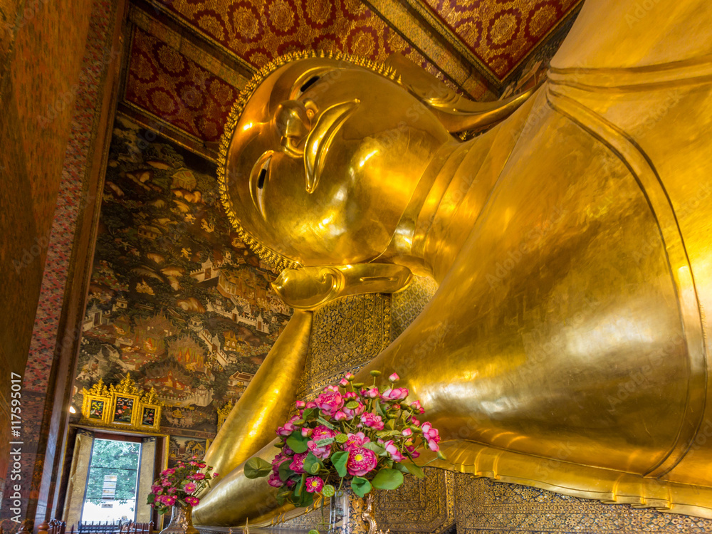 Reclining Buddha of Wat Po Buddhist temple complex in Bangkok, Thailand.