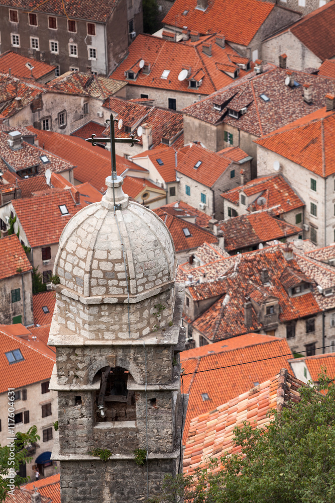 Dome of church of Our Lady of the Health and roofs of old town of Kotor city. Bay of Kotor (Boka Kotorska). Montenegro