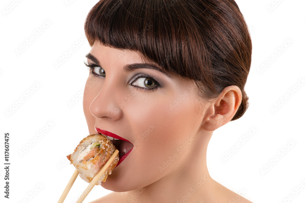 beautiful woman eating roll with salmon beautiful woman eating roll with salmon
