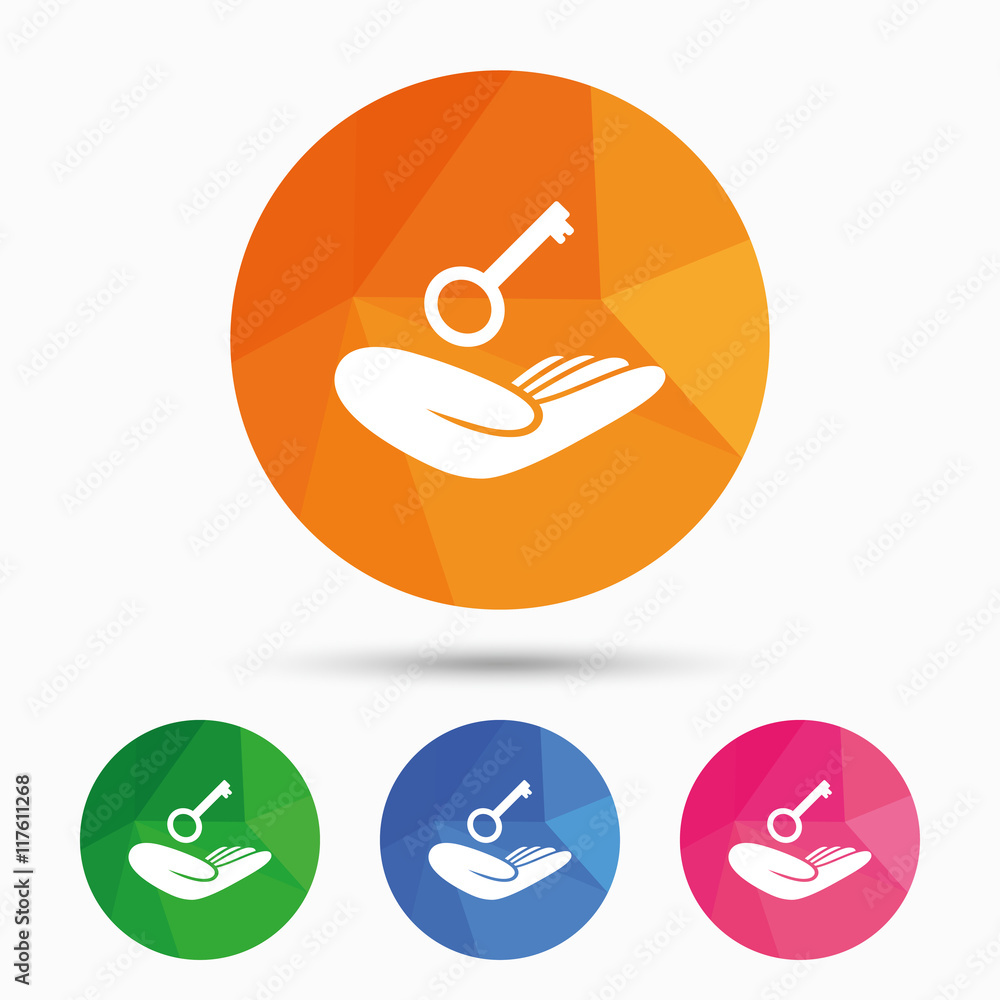 House insurance sign. Hand holds home key symbol House insurance sign. Hand holds home key symbol