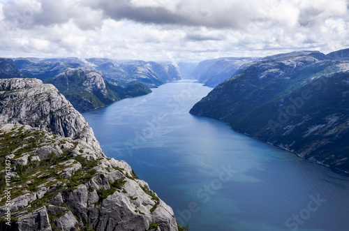 Lysefjorden from Preikestolen in Norway with the clouds in the sky © knik