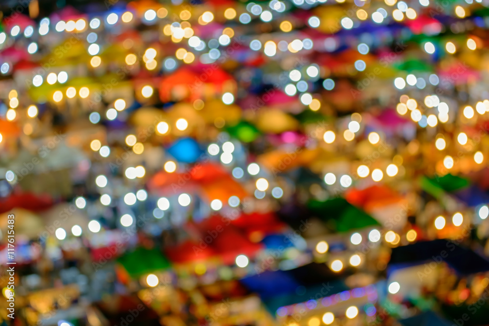 Thai night market / Blur of famous night market at twilight. Ratchada Train Market : second hand night market, Bangkok, Thailand. Thai night market / Blur of famous night market at twilight. Ratchada Train Market : second hand night market, Bangkok, Thailand.