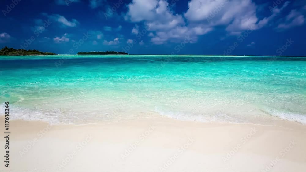 Romantic sandy beach with vibrant clean lagoon in Maldives. Romantic sandy beach with vibrant clean lagoon in Maldives.