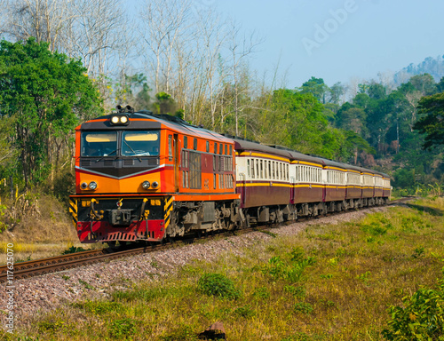 Passenger train was passing through hill side field, 2016. 