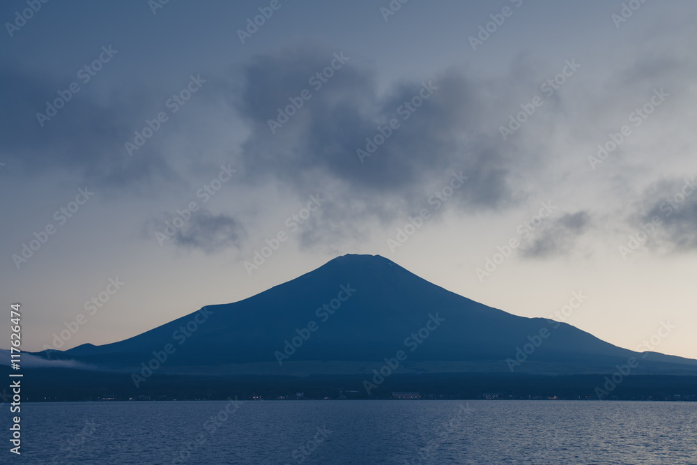 Mountain Fuji and cloud with beautiful sunset sky at lake Yamanakako in summer evening Mountain Fuji and cloud with beautiful sunset sky at lake Yamanakako in summer evening