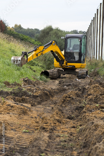 small yellow excavator