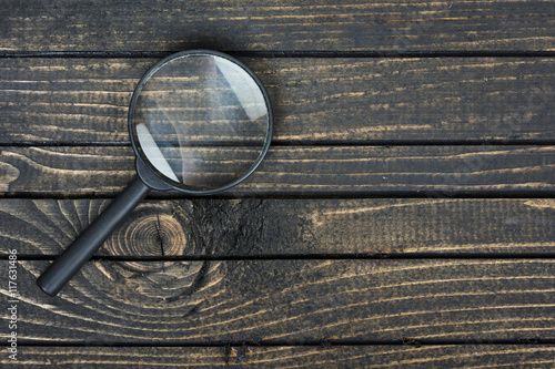 Magnifying glass on table