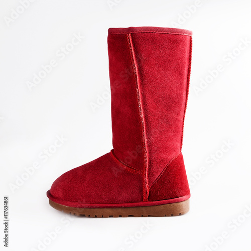 Womens red Sheepskin boots isolated on white photo