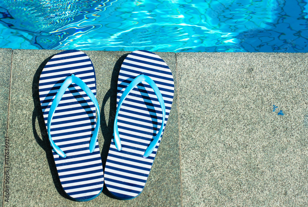 Naklejka premium Stripped flip-flops