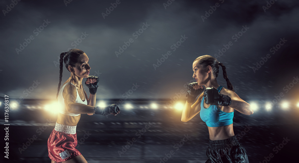 Girls boxing in ring . Mixed media Girls boxing in ring . Mixed media