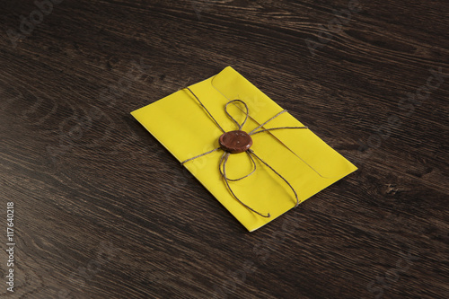 Letter with seal on table