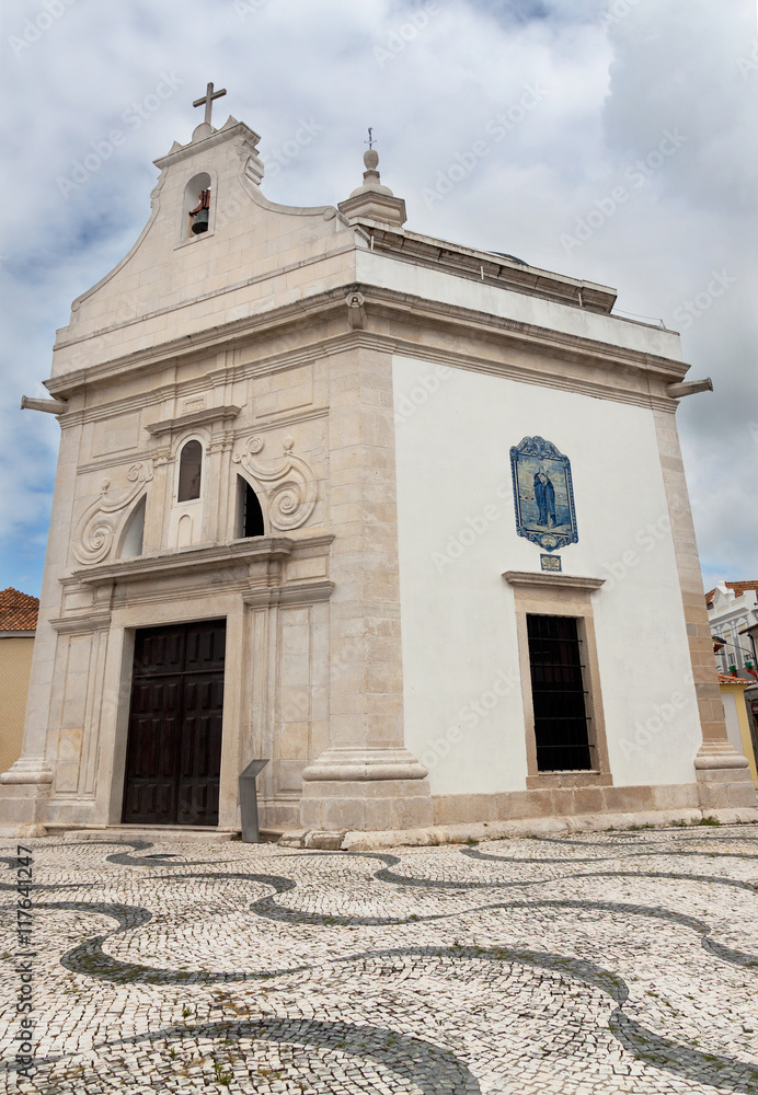 Exterior of small white church in Portugal.