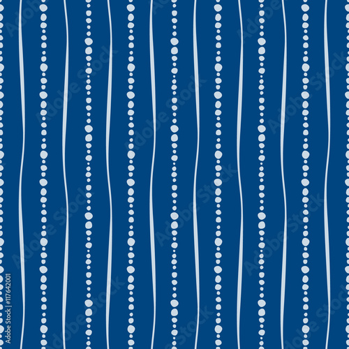 Seamless vector decorative hand drawn pattern. Blue geometric endless background with dots and vertical lines. photo