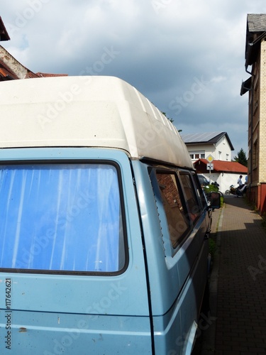 Altes deutsches Wohnmobil der Achtzigerjahre mit weißem Hochdach für Vanlife und Camping beim Oldtimertreffen Golden Oldies in Wettenberg Krofdorf-Gleiberg bei Gießen in Hessen photo