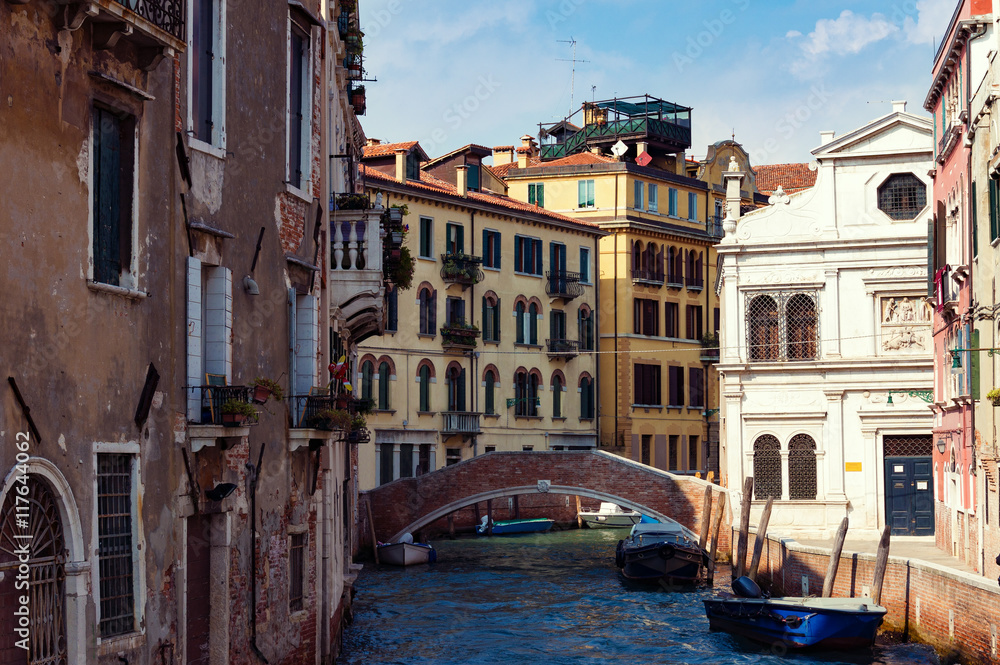 Exteriors of old Venice houses, buildings on water. Italy