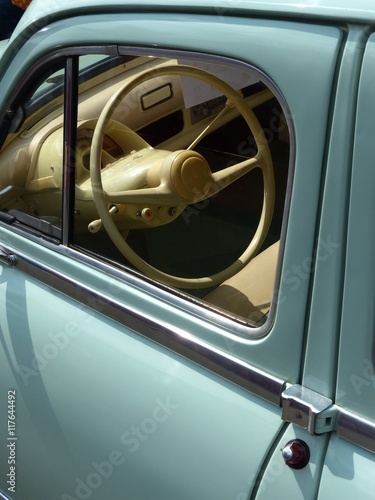 Beigefarbenes Interieur einer alten französischen Limousine der Fünfziger Jahre in Mintfarben beim Oldtimertreffen Golden Oldies in Wettenberg Krofdorf-Gleiberg bei Gießen in Hessen photo