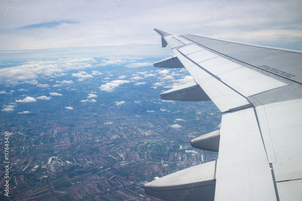 the airplane is taking off over city the airplane is taking off over city