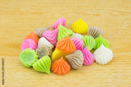 Aalaw candy, colorful Thai dessert on wood background