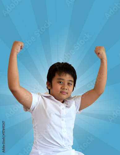 boy raise up two hand feel success and strong