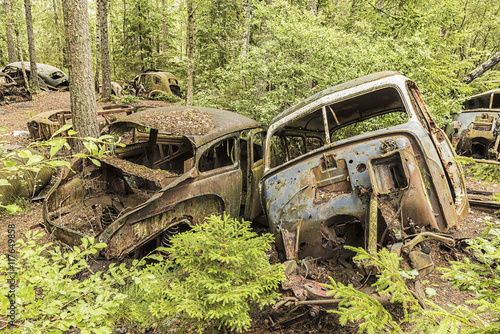 Car Junkyard in Sweden. photo