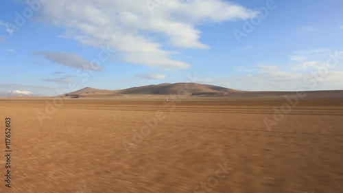 Panoramic view of bolivian altiplano from moving car, Bolivia