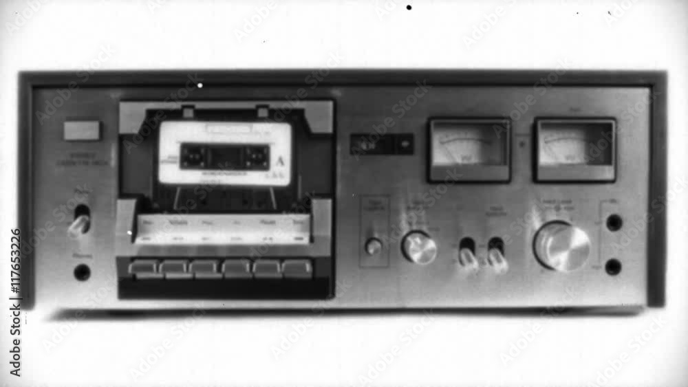 audio cassettes in a retro tape player audio cassettes in a retro tape player