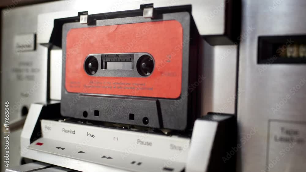 audio cassettes in a retro tape player audio cassettes in a retro tape player