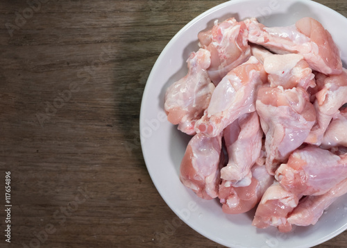 Raw chicken wings in a bow prepare for cooking.