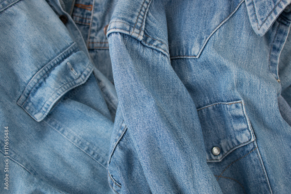 Detail of denim shirt in studio shot Detail of denim shirt in studio shot