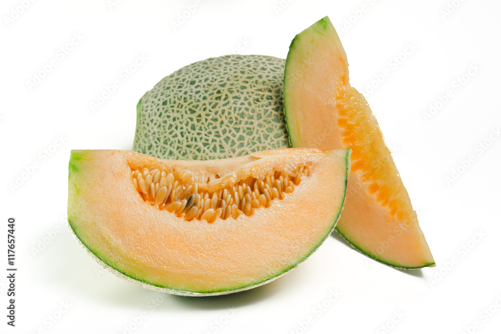 Cucumis melo or melon with half and seeds on white (Other names