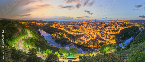 Night view of Toledo cityscape and Tagus River from the hill, Castilla la Mancha, Spain